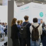 Visitors exploring KARL MAYER textile technologies