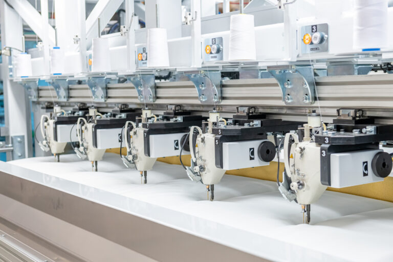 zoomed in view iof Automatex P12-PB automated quilting machine for bedding production